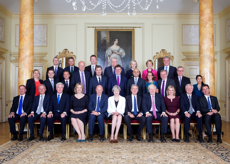 Illustration for article titled That Viral Photo of Theresa May With The Scream Painting is Totally Fake